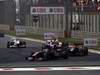 GP CINA, 17.04.2011- Gara, Sébastien Buemi (SUI), Scuderia Toro Rosso, STR6 davanti a Nick Heidfeld (GER) Lotus Renault GP R31  