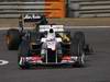 GP CINA, 17.04.2011- Gara, Kamui Kobayashi (JAP), Sauber F1 Team C30 davanti a Heikki Kovalainen (FIN), Team Lotus, TL11 