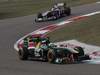 GP CINA, 17.04.2011- Gara, Heikki Kovalainen (FIN), Team Lotus, TL11 davanti a Rubens Barrichello (BRA), Williams FW33 
