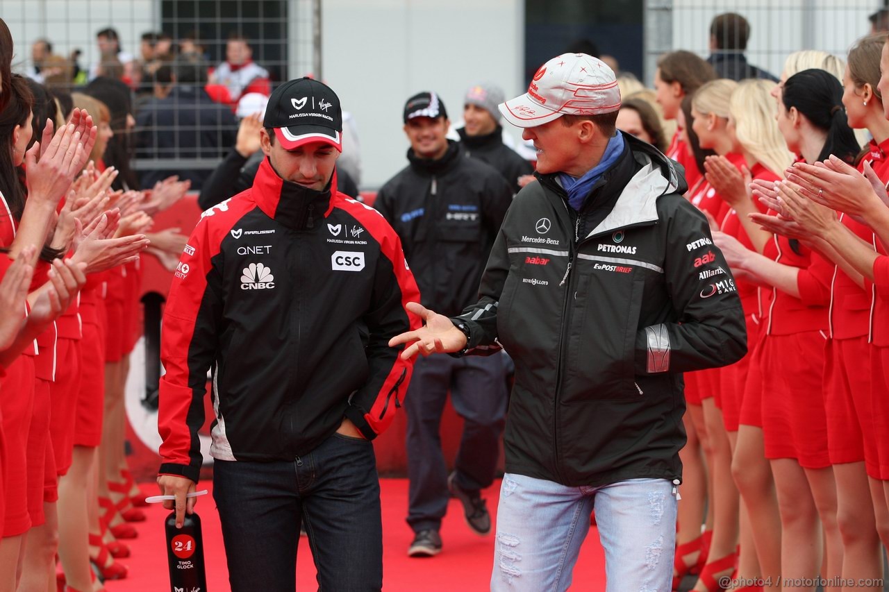 GP GERMANIA, 24.07.2011- Timo Glock (GER), Marussia Virgin Racing VR-02 e Michael Schumacher (GER), Mercedes GP Petronas F1 Team, MGP W02 