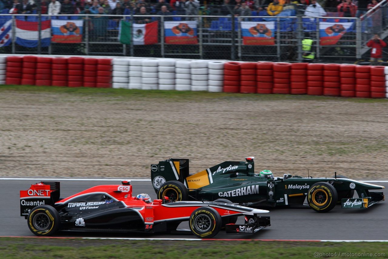 GP GERMANIA, 24.07.2011- Gara, Timo Glock (GER), Marussia Virgin Racing VR-02 e Heikki Kovalainen (FIN), Team Lotus, TL11 