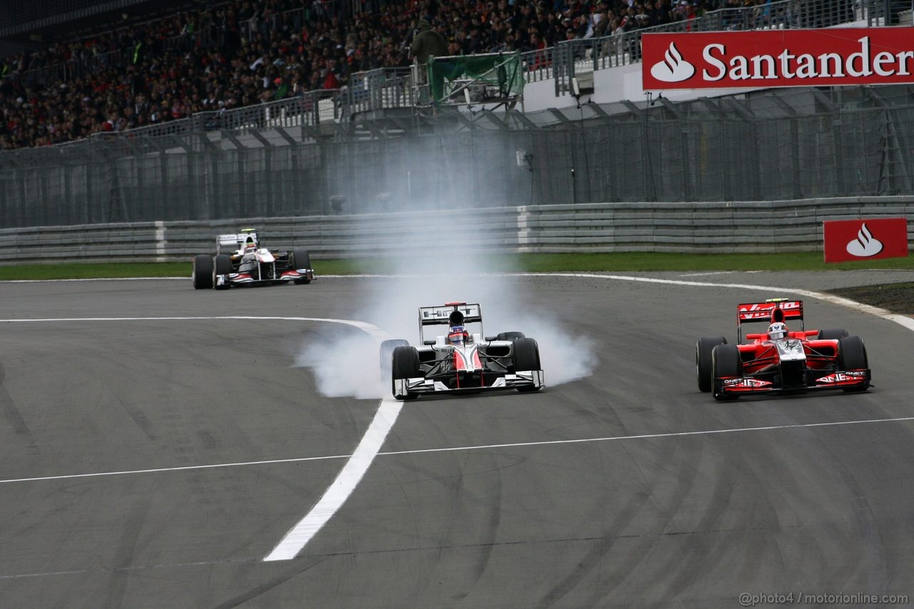 GP GERMANIA, 24.07.2011- Gara, Daniel Ricciardo (AUS), HRT Formula One Team e Jerome D'Ambrosio (BEL), Marussia Virgin Racing VR-02 