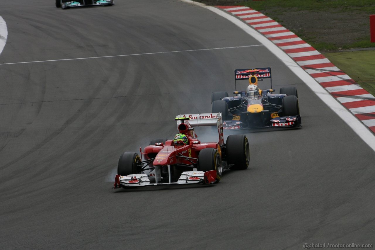 GP GERMANIA, 24.07.2011- Gara, Felipe Massa (BRA), Ferrari, F-150 Italia davanti a Sebastian Vettel (GER), Red Bull Racing, RB7 