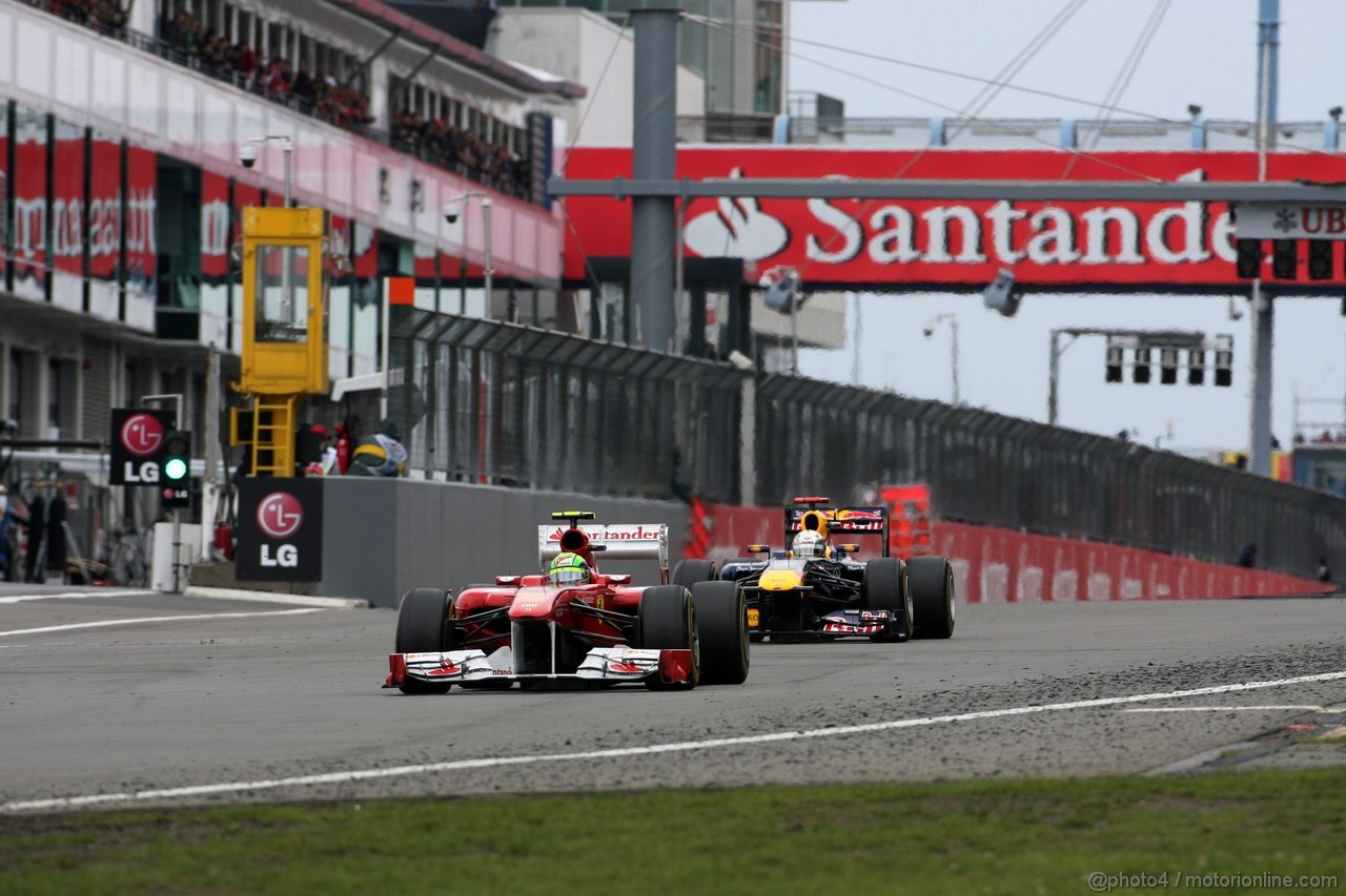 GP GERMANIA, 24.07.2011- Gara, Felipe Massa (BRA), Ferrari, F-150 Italia davanti a Sebastian Vettel (GER), Red Bull Racing, RB7 