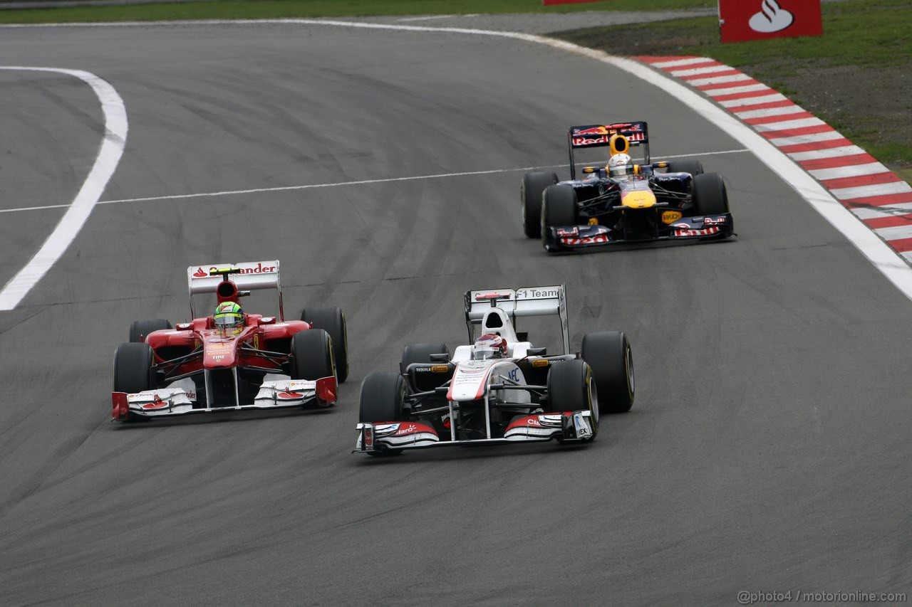 GP GERMANIA, 24.07.2011- Gara, Felipe Massa (BRA), Ferrari, F-150 Italia e Kamui Kobayashi (JAP), Sauber F1 Team C30 lead Sebastian Vettel (GER), Red Bull Racing, RB7 