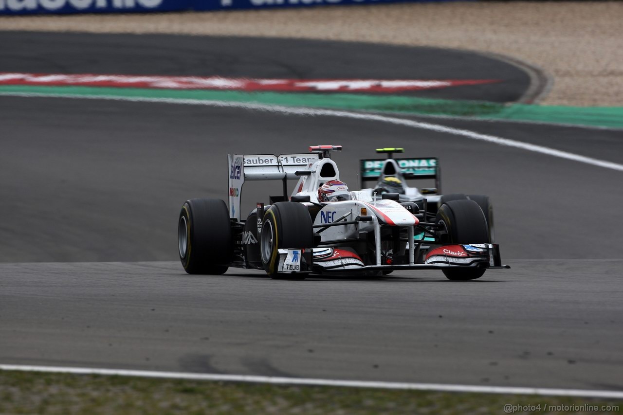 GP GERMANIA, 24.07.2011- Gara, Kamui Kobayashi (JAP), Sauber F1 Team C30 e Nico Rosberg (GER), Mercedes GP Petronas F1 Team, MGP W02 