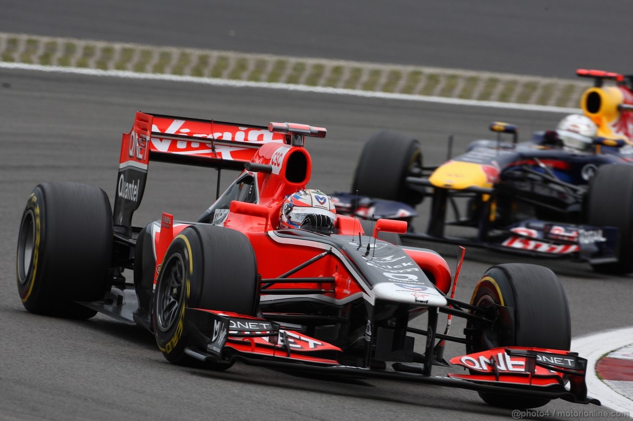 GP GERMANIA, 24.07.2011- Gara, Timo Glock (GER), Marussia Virgin Racing VR-02 davanti a Sebastian Vettel (GER), Red Bull Racing, RB7 