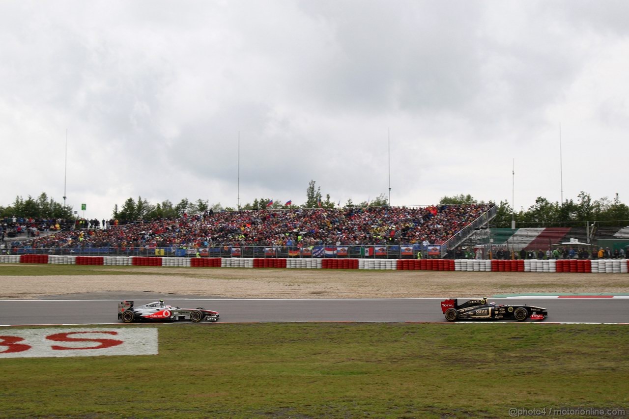 GP GERMANIA, 24.07.2011- Gara, Jenson Button (GBR), McLaren  Mercedes, MP4-26 e Vitaly Petrov (RUS), Lotus Renault GP, R31 