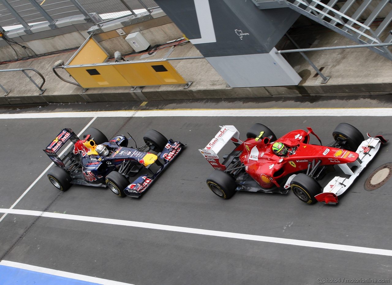 GP GERMANIA, 24.07.2011- Gara, Par Fermé, Sebastian Vettel (GER), Red Bull Racing, RB7 e Felipe Massa (BRA), Ferrari, F-150 Italia 