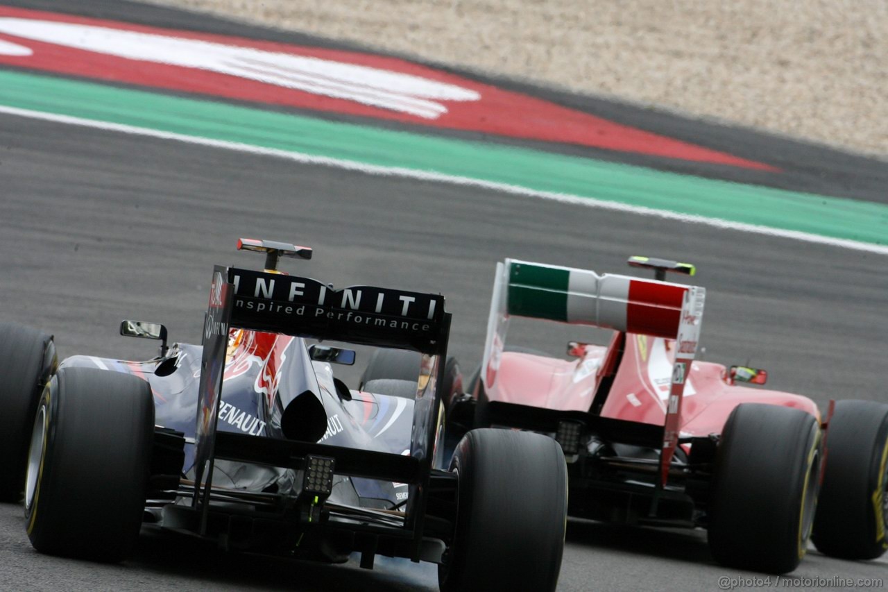 GP GERMANIA, 24.07.2011- Gara, Sebastian Vettel (GER), Red Bull Racing, RB7 e Felipe Massa (BRA), Ferrari, F-150 Italia 