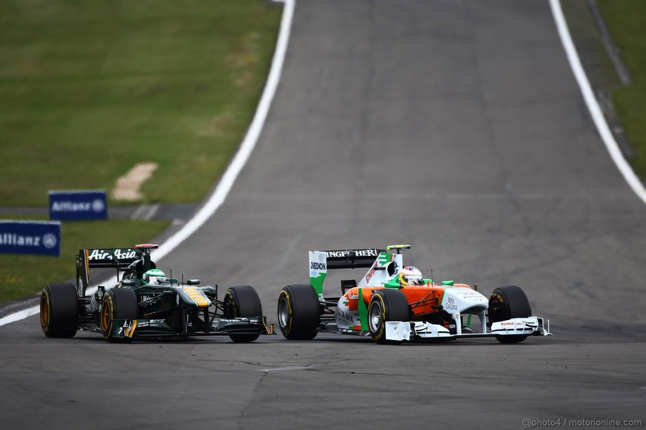 GP GERMANIA, 24.07.2011- Gara, Heikki Kovalainen (FIN), Team Lotus, TL11 e Paul di Resta (GBR) Force India VJM04 