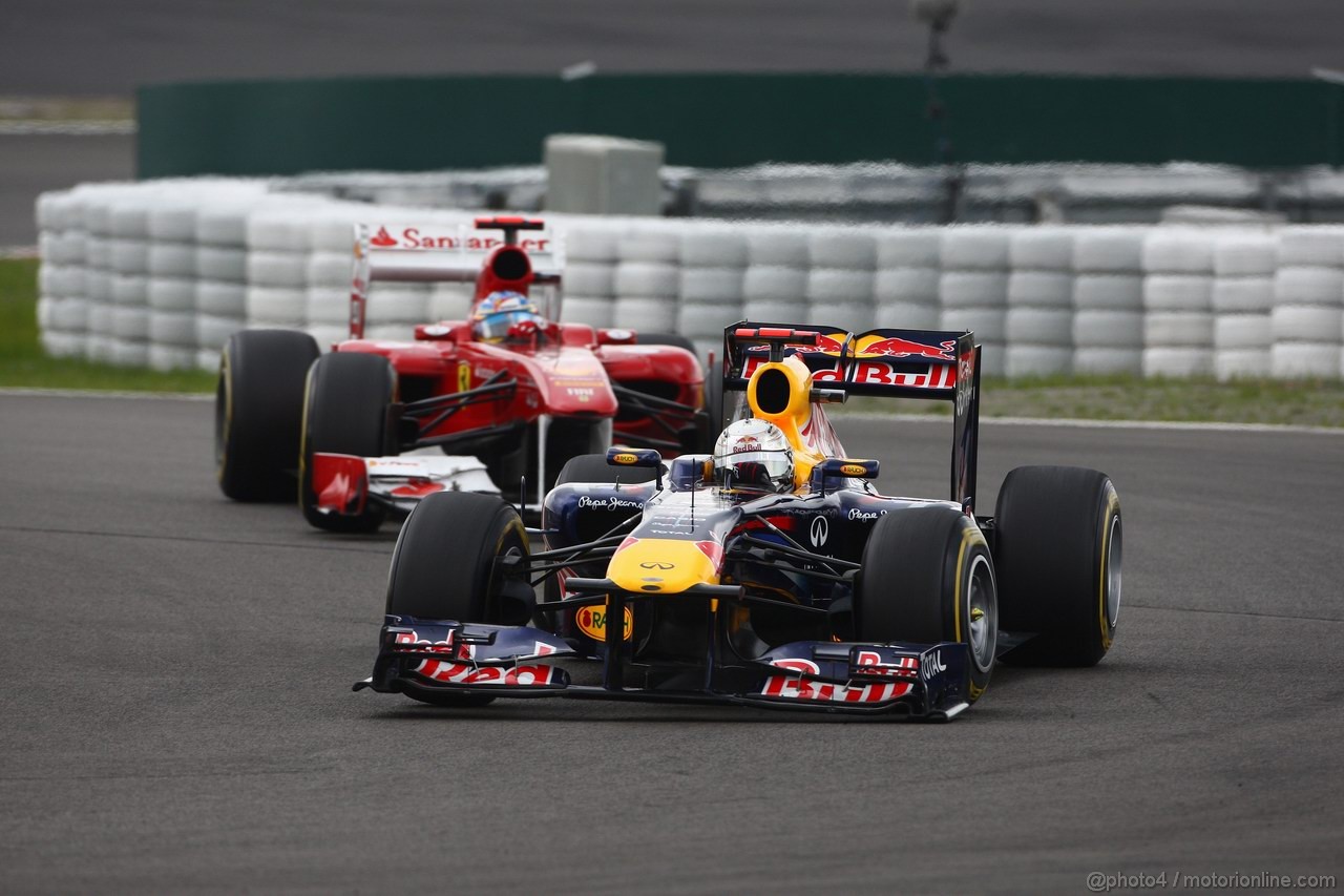 GP GERMANIA, 24.07.2011- Gara, Sebastian Vettel (GER), Red Bull Racing, RB7 davanti a Fernando Alonso (ESP), Ferrari, F-150 Italia 