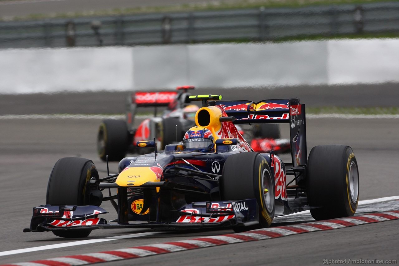 GP GERMANIA, 24.07.2011- Gara, Mark Webber (AUS), Red Bull Racing, RB7 davanti a Lewis Hamilton (GBR), McLaren  Mercedes, MP4-26 