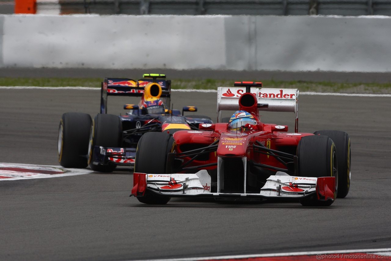 GP GERMANIA, 24.07.2011- Gara, Fernando Alonso (ESP), Ferrari, F-150 Italia davanti a Mark Webber (AUS), Red Bull Racing, RB7 