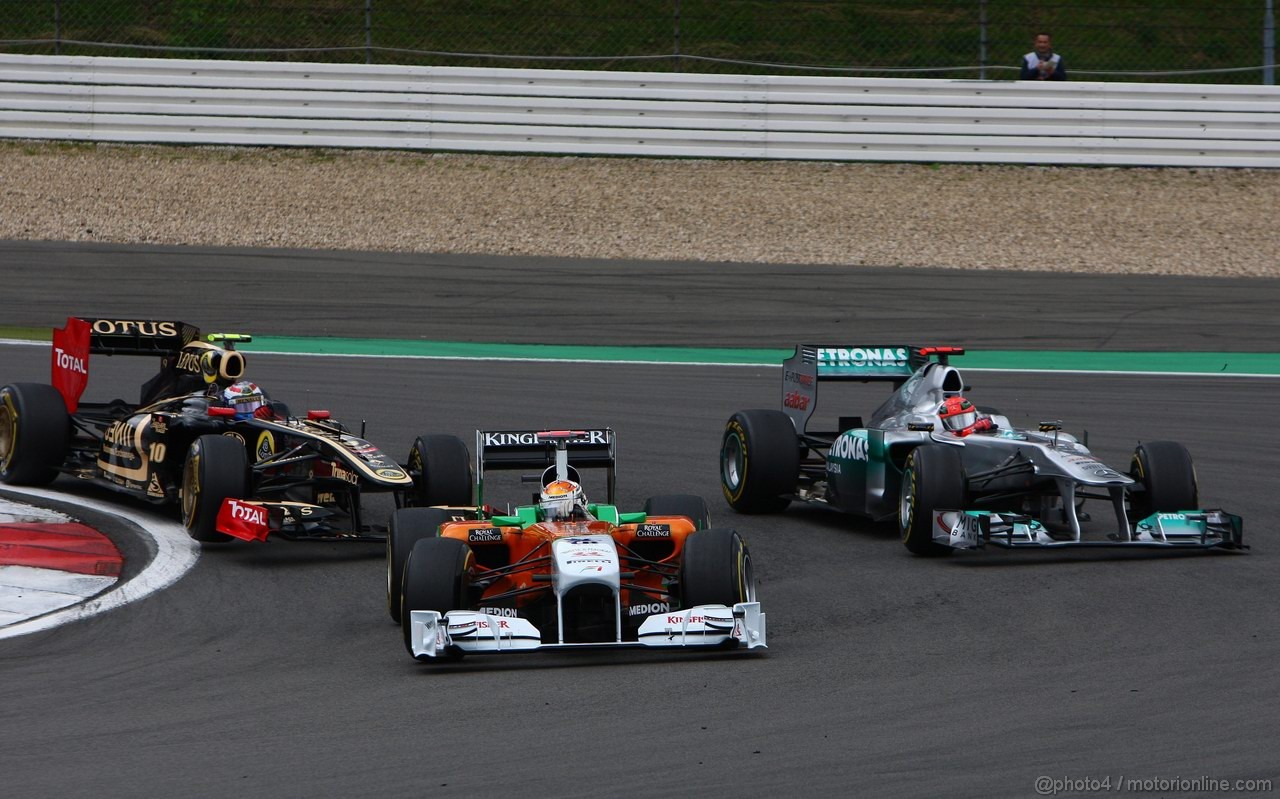 GP GERMANIA, 24.07.2011- Gara, Vitaly Petrov (RUS), Lotus Renault GP, R31, Adrian Sutil (GER), Force India F1 Team, VJM04 e Michael Schumacher (GER), Mercedes GP Petronas F1 Team, MGP W02 