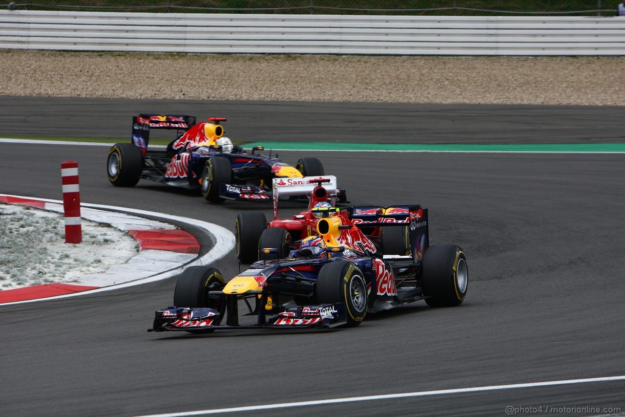 GP GERMANIA, 24.07.2011- Gara, Mark Webber (AUS), Red Bull Racing, RB7 davanti a Fernando Alonso (ESP), Ferrari, F-150 Italia e Sebastian Vettel (GER), Red Bull Racing, RB7 