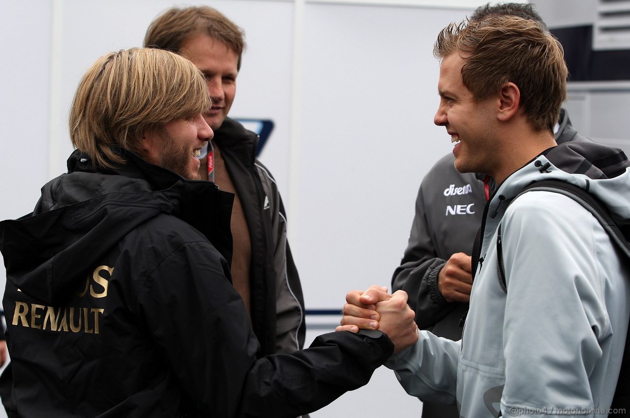 GP GERMANIA, 21.07.2011- Nick Heidfeld (GER) Lotus Renault GP R31  e Sebastian Vettel (GER), Red Bull Racing, RB7 