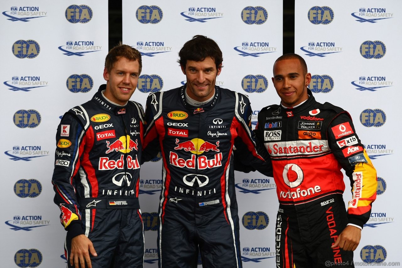 GP GERMANIA, 23.07.2011- Qualifiche, Sebastian Vettel (GER), Red Bull Racing, RB7 terzo, Mark Webber (AUS), Red Bull Racing, RB7 pole position e Lewis Hamilton (GBR), McLaren  Mercedes, MP4-26 secondo 