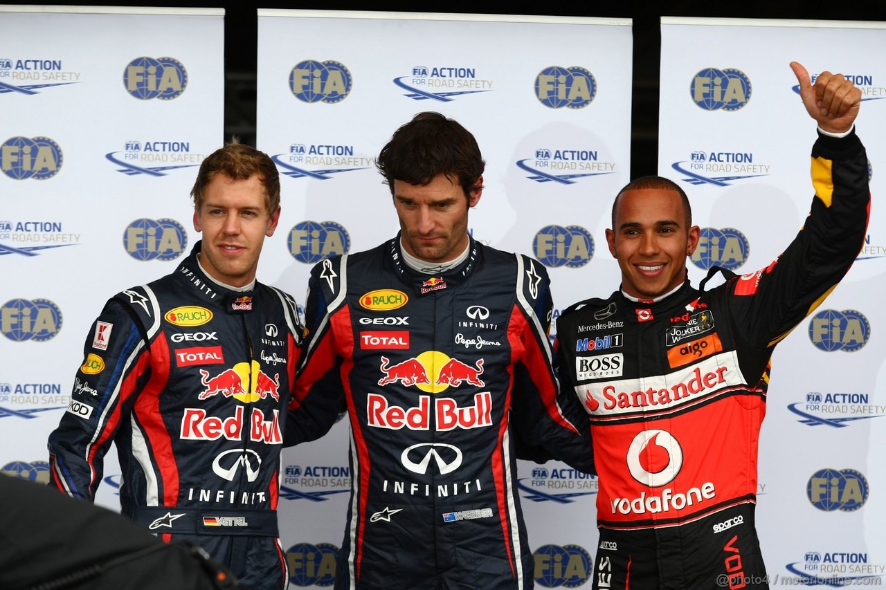 GP GERMANIA, 23.07.2011- Qualifiche, Sebastian Vettel (GER), Red Bull Racing, RB7 terzo, Mark Webber (AUS), Red Bull Racing, RB7 pole position e Lewis Hamilton (GBR), McLaren  Mercedes, MP4-26 secondo 