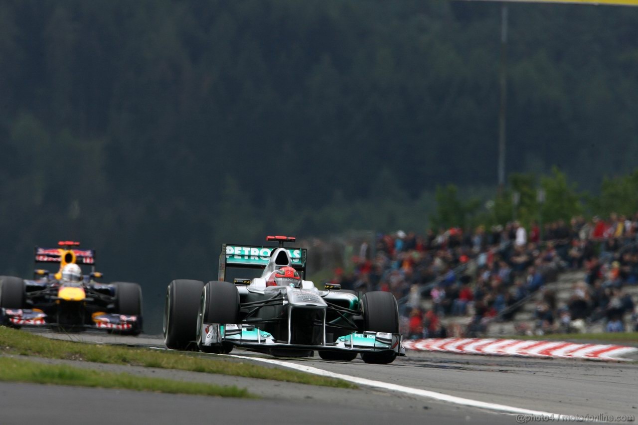 GP GERMANIA, 22.07.2011- Prove Libere 1, Venerdi', Sebastian Vettel (GER), Red Bull Racing, RB7 e Michael Schumacher (GER), Mercedes GP Petronas F1 Team, MGP W02 