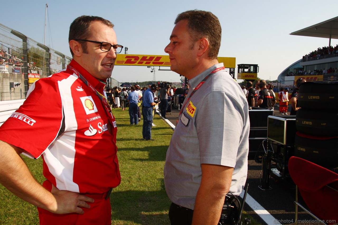 GP GIAPPONE, 09.10.2011- Gara, Stefano Domenicali (ITA), Team Principal e Mario Isola (ITA), Sporting Director Pirelli