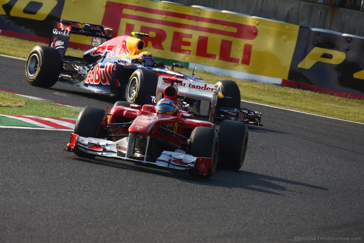 GP GIAPPONE, 09.10.2011- Gara, Fernando Alonso (ESP), Ferrari, F-150 Italia davanti a Mark Webber (AUS), Red Bull Racing, RB7