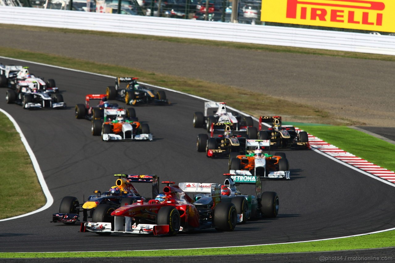 GP GIAPPONE, 09.10.2011- Gara, Mark Webber (AUS), Red Bull Racing, RB7 e Fernando Alonso (ESP), Ferrari, F-150 Italia 