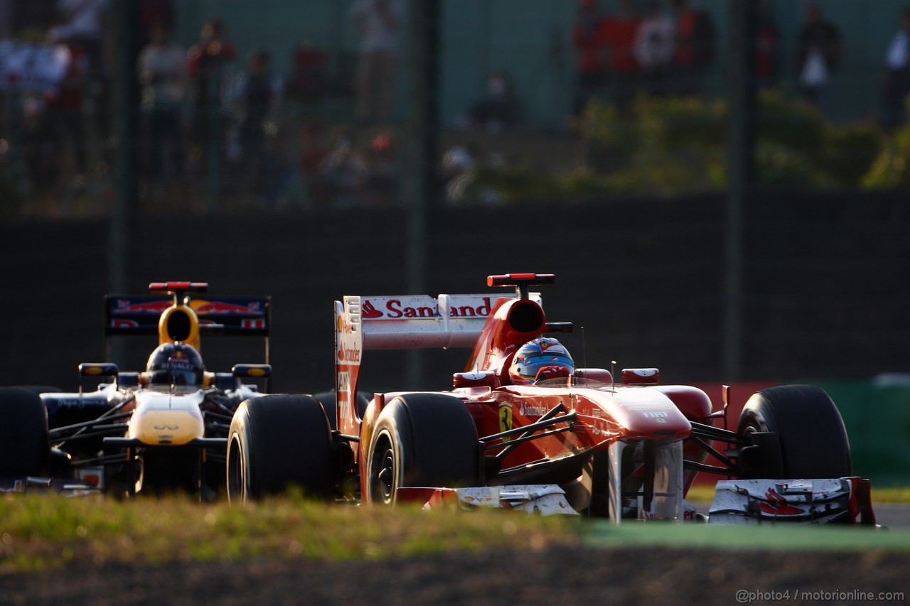GP GIAPPONE, 09.10.2011- Gara, Fernando Alonso (ESP), Ferrari, F-150 Italia davanti a Sebastian Vettel (GER), Red Bull Racing, RB7