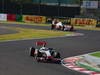 GP GIAPPONE, 09.10.2011- Gara, Lewis Hamilton (GBR), McLaren Mercedes, MP4-26 davanti a Jenson Button (GBR), McLaren Mercedes, MP4-26