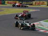GP GIAPPONE, 09.10.2011- Gara, Jarno Trulli (ITA), Team Lotus, TL11 davanti a Jerome D'Ambrosio (BEL), Marussia Virgin Racing VR-02 