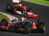 GP GIAPPONE, 09.10.2011- Gara, Lewis Hamilton (GBR), McLaren Mercedes, MP4-26 davanti a Felipe Massa (BRA), Ferrari, F-150 Italia