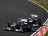 GP GIAPPONE, 09.10.2011- Gara, Pastor Maldonado (VEN), Williams FW33 davanti a Rubens Barrichello (BRA), Williams FW33