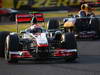 GP GIAPPONE, 09.10.2011- Gara, Jenson Button (GBR), McLaren Mercedes, MP4-26 davanti a Sebastian Vettel (GER), Red Bull Racing, RB7