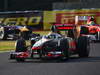 GP GIAPPONE, 09.10.2011- Gara, Lewis Hamilton (GBR), McLaren Mercedes, MP4-26 davanti a Felipe Massa (BRA), Ferrari, F-150 Italia