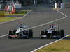 GP GIAPPONE, 09.10.2011- Gara, Kamui Kobayashi (JAP), Sauber F1 Team C30 e Rubens Barrichello (BRA), Williams FW33
