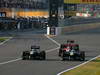 GP GIAPPONE, 09.10.2011- Gara, Heikki Kovalainen (FIN), Team Lotus, TL11 e Jarno Trulli (ITA), Team Lotus, TL11