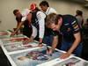 GP GIAPPONE, 07.10.2011- The 5 world champions with signed photos commissioned by Bernie Ecclestone (GBR) to then be put up for auction to raise money for the Japanese disaster, Jenson Button (GBR), McLaren  Mercedes, MP4-26, Fernando Alonso (ESP), Ferrari, F-150 Italia, Michael Schumacher (GER), Mercedes GP Petronas F1 Team, MGP W02, Sebastian Vettel (GER), Red Bull Racing, RB7 
