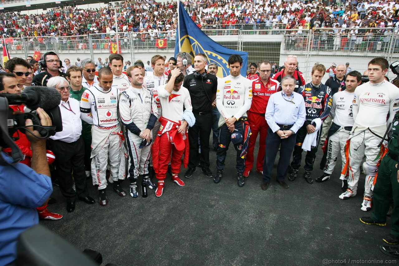 GP INDIA, F1 respects a minutes silence for Dan Wheldon & Marco Simoncelli