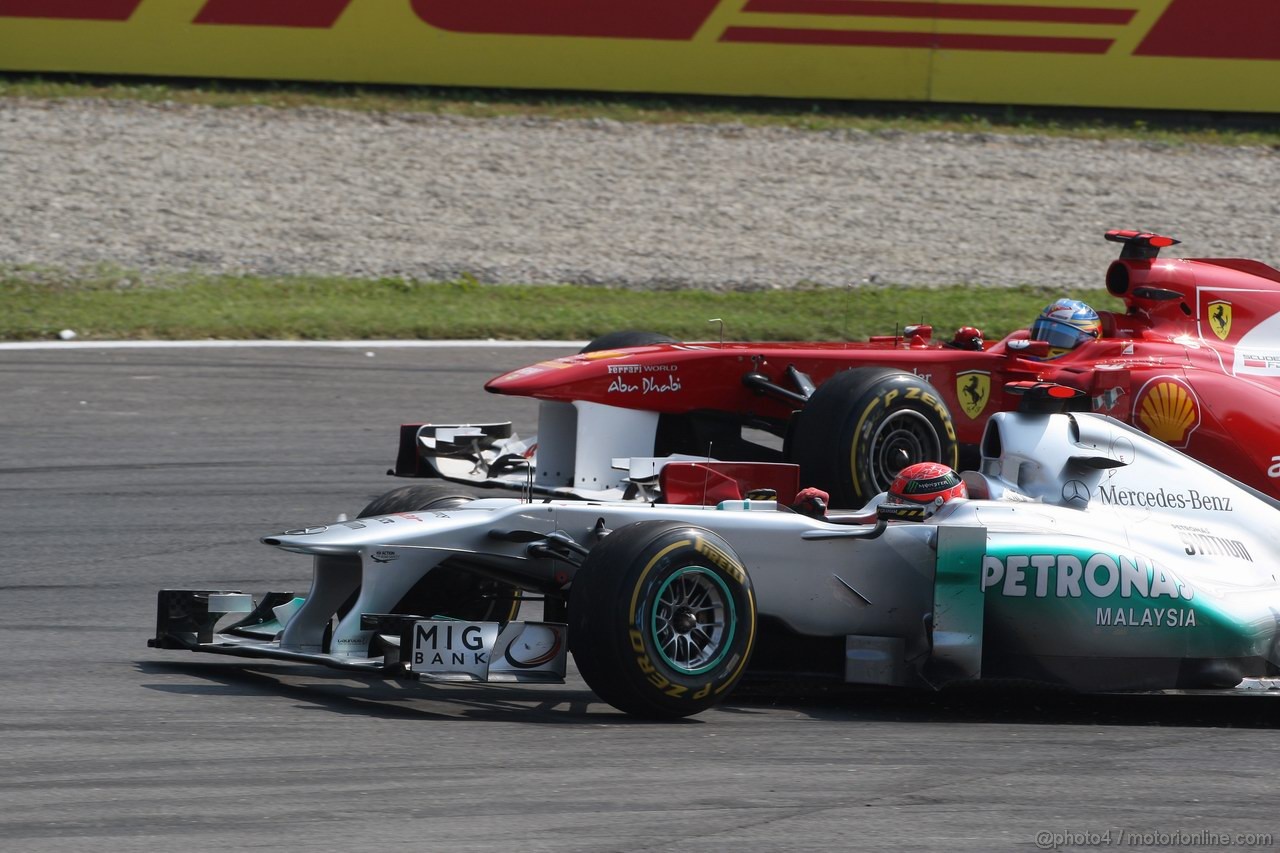 GP ITALIA, 11.09.2011- Gara, Fernando Alonso (ESP), Ferrari, F-150 Italia e Michael Schumacher (GER), Mercedes GP Petronas F1 Team, MGP W02