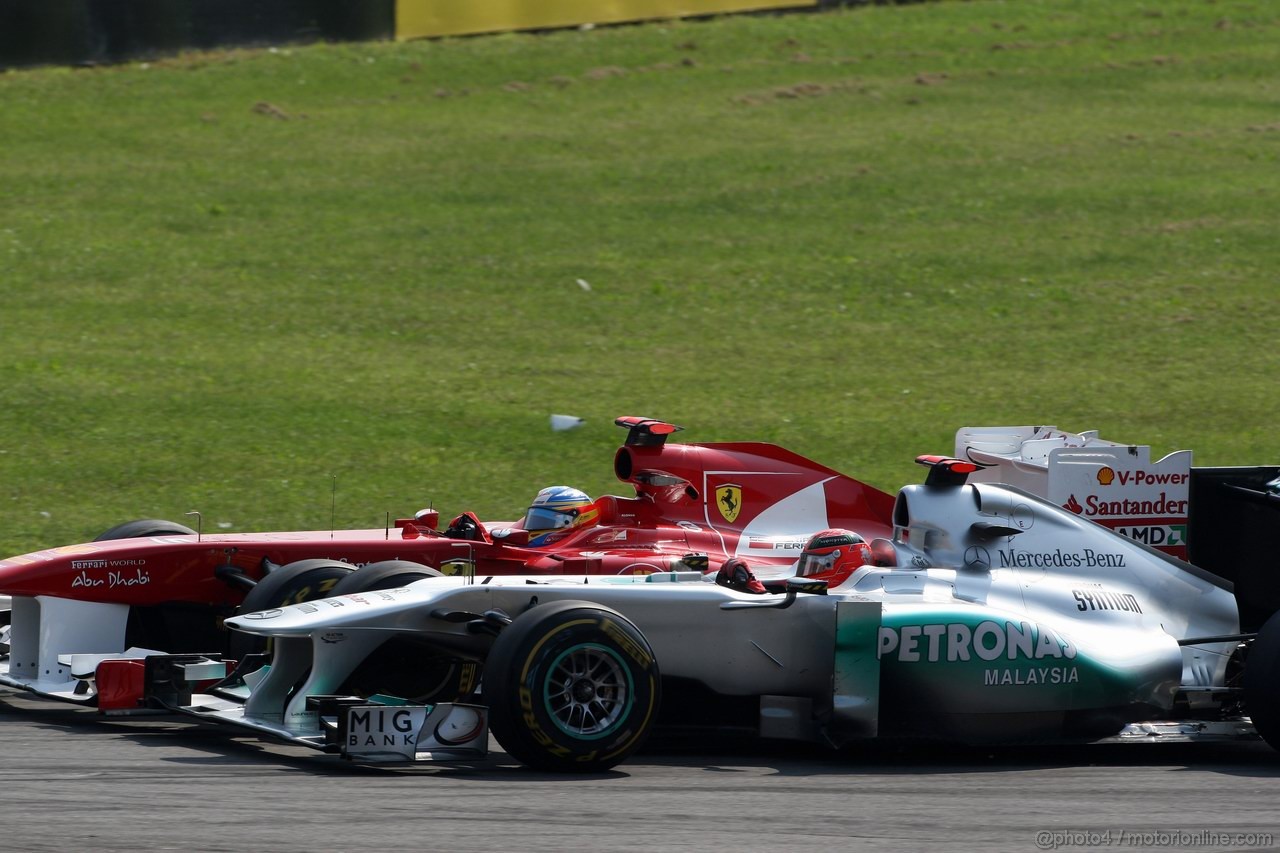 GP ITALIA, 11.09.2011- Gara, Fernando Alonso (ESP), Ferrari, F-150 Italia e Michael Schumacher (GER), Mercedes GP Petronas F1 Team, MGP W02 