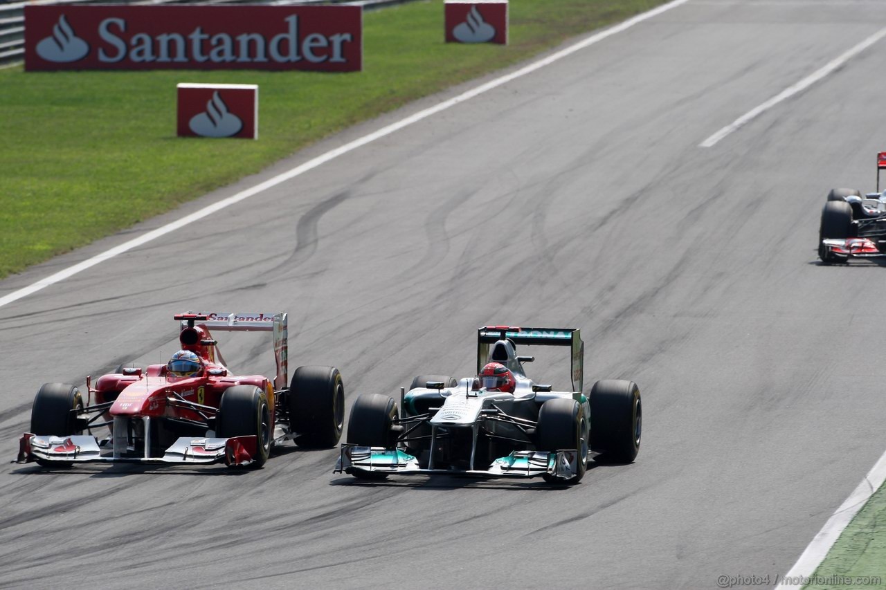 GP ITALIA, 11.09.2011- Gara, Fernando Alonso (ESP), Ferrari, F-150 Italia e Michael Schumacher (GER), Mercedes GP Petronas F1 Team, MGP W02 