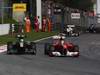 GP ITALIA, 11.09.2011- Gara, Heikki Kovalainen (FIN), Team Lotus, TL11 e Felipe Massa (BRA), Ferrari, F-150 Italia 