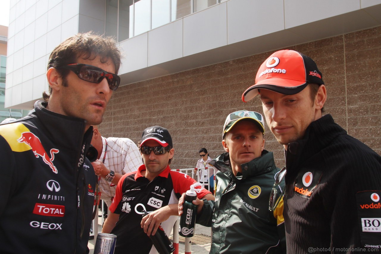 GP KOREA, 16.10.2011- Mark Webber (AUS), Red Bull Racing, RB7, Timo Glock (GER), Marussia Virgin Racing VR-02, Heikki Kovalainen (FIN), Team Lotus, TL11 e Jenson Button (GBR), McLaren  Mercedes, MP4-26 at drivers parade  