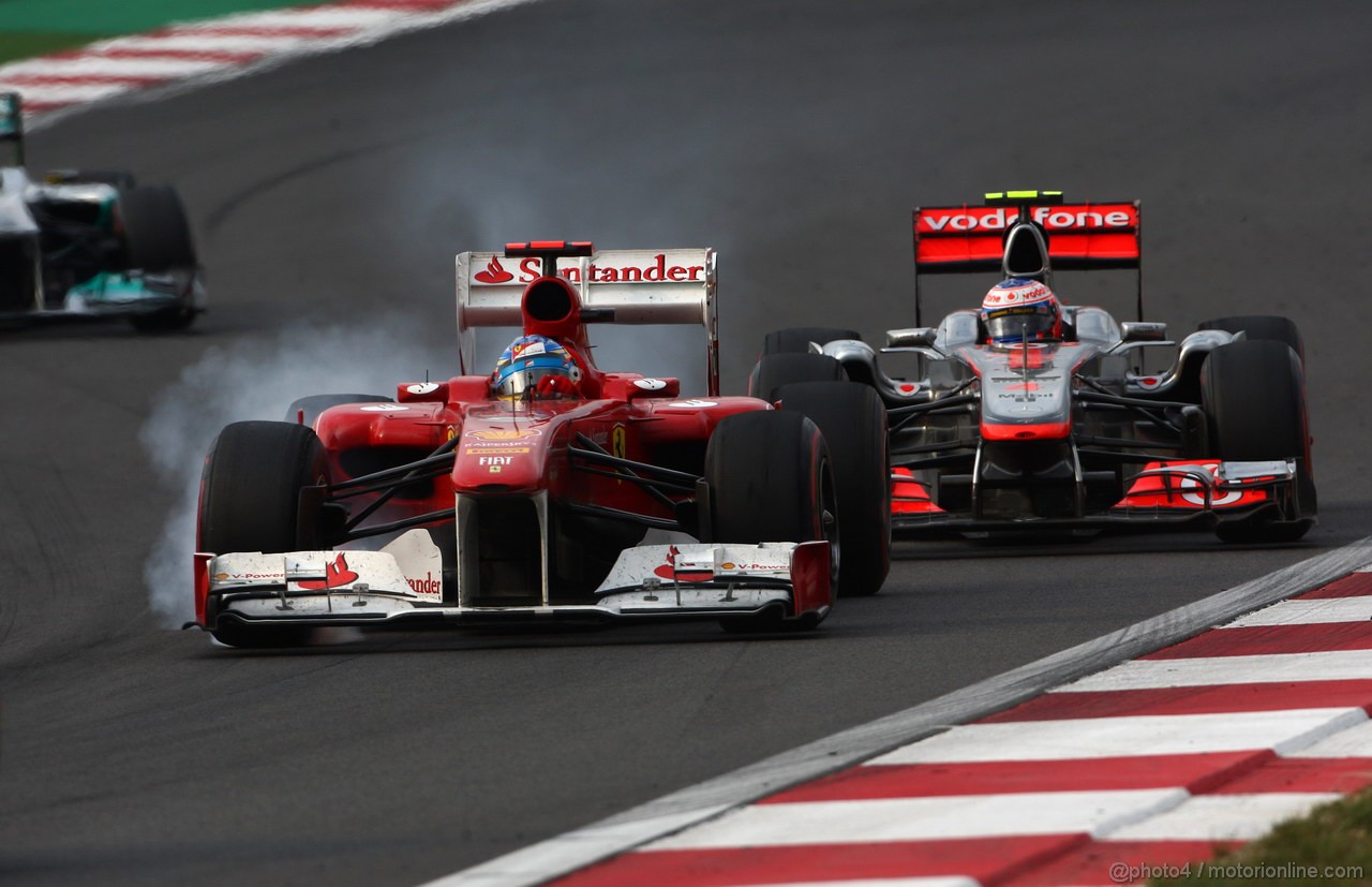 GP KOREA, 16.10.2011- Gara, Fernando Alonso (ESP), Ferrari, F-150 Italia e Jenson Button (GBR), McLaren  Mercedes, MP4-26 