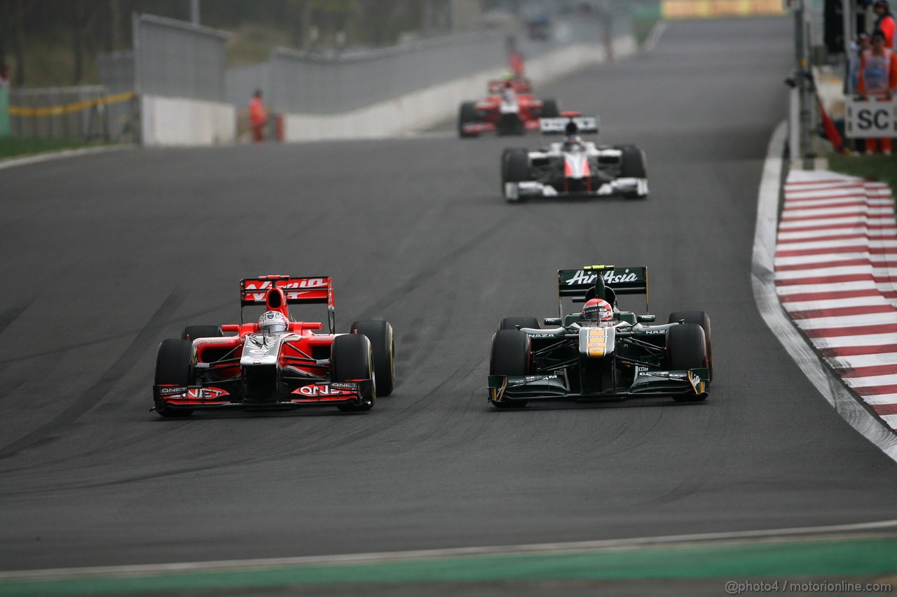GP KOREA, 16.10.2011- Gara, Timo Glock (GER), Marussia Virgin Racing VR-02 e Jarno Trulli (ITA), Team Lotus, TL11 