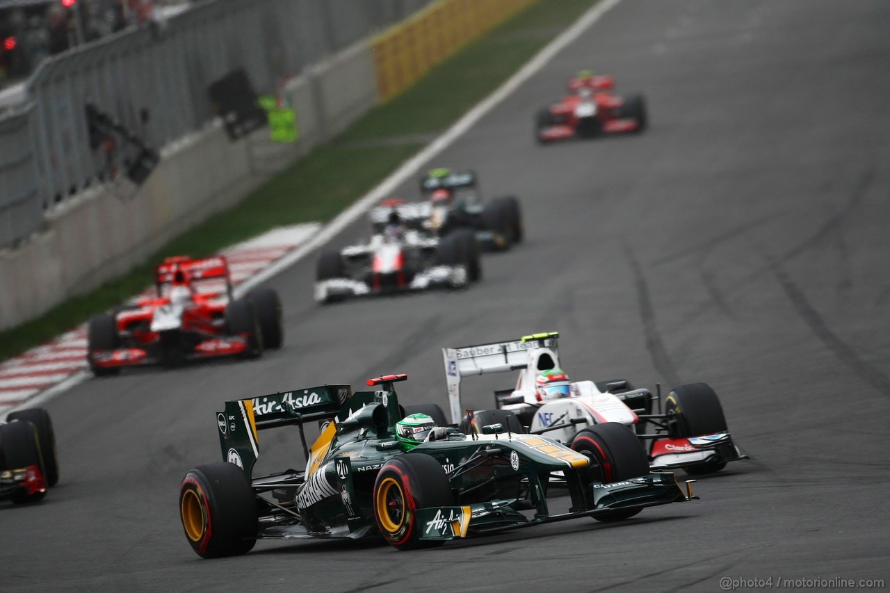 GP KOREA, 16.10.2011- Gara, Heikki Kovalainen (FIN), Team Lotus, TL11 e Sergio P�rez (MEX), Sauber F1 Team C30 