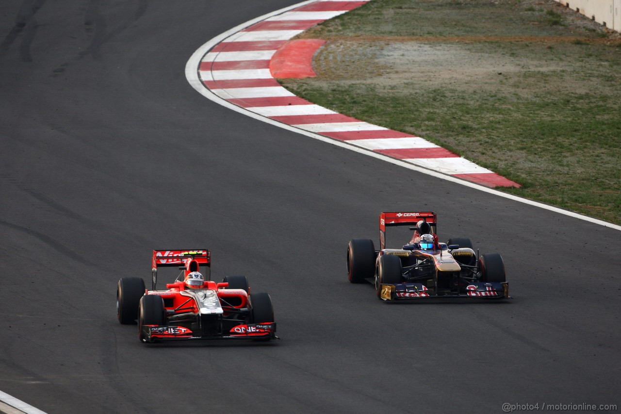 GP KOREA, 16.10.2011- Gara, Jerome D'Ambrosio (BEL), Marussia Virgin Racing VR-02 e S�bastien Buemi (SUI), Scuderia Toro Rosso, STR6 
