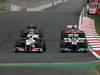 GP KOREA, 16.10.2011- Gara, Sergio P�rez (MEX), Sauber F1 Team C30 e Michael Schumacher (GER), Mercedes GP Petronas F1 Team, MGP W02 