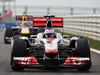GP KOREA, 15.10.2011- Qualifiche, Jenson Button (GBR), McLaren Mercedes, MP4-26 e Mark Webber (AUS), Red Bull Racing, RB7
