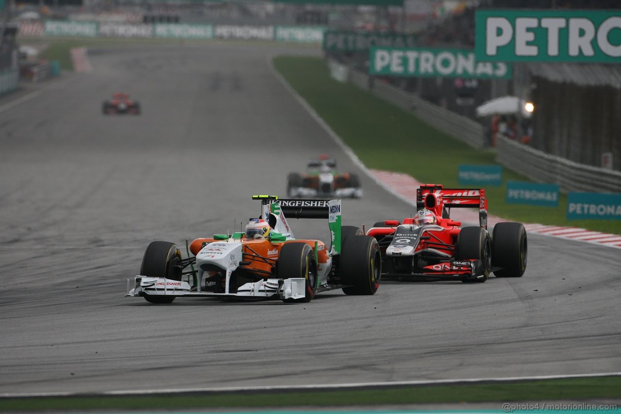 GP MALESIA, 10.04.2011- Gara, Paul di Resta (GBR) Force India VJM04 davanti a Timo Glock (GER), Marussia Virgin Racing VR-02 